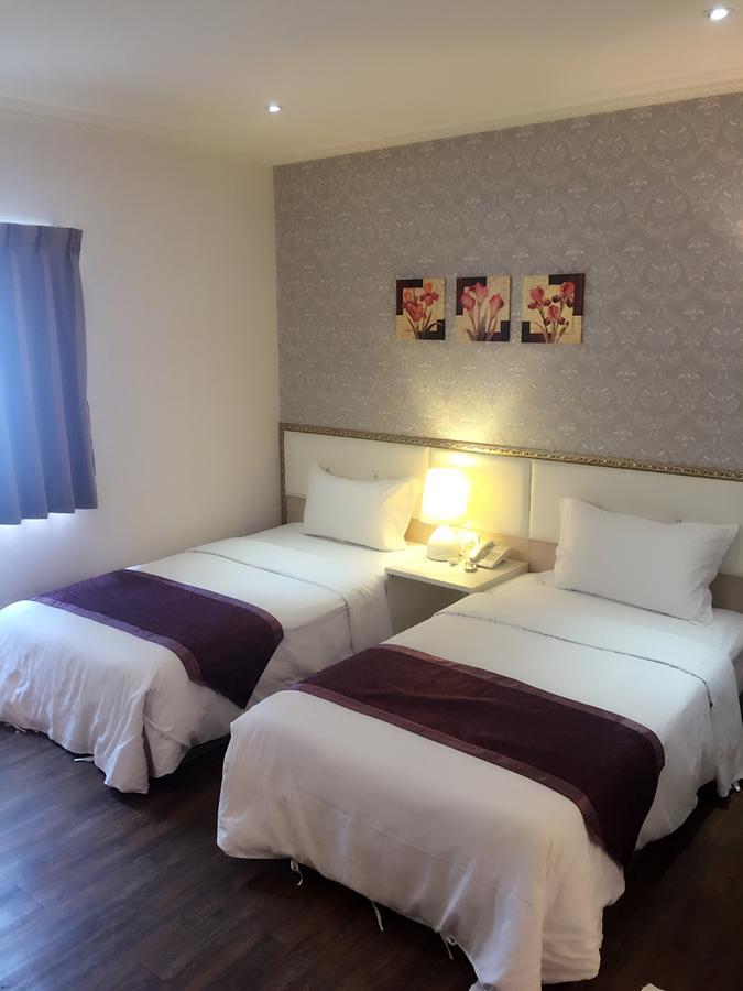 Jungle City Motel นครเจียอี้ ภายนอก รูปภาพ