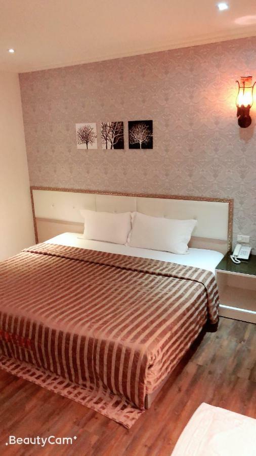Jungle City Motel นครเจียอี้ ภายนอก รูปภาพ